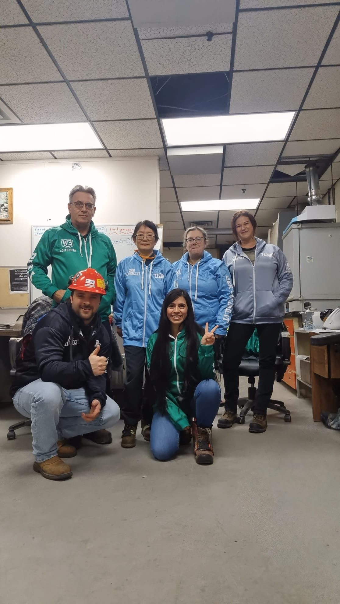 Domtar Team in EW Athletics Hoodies